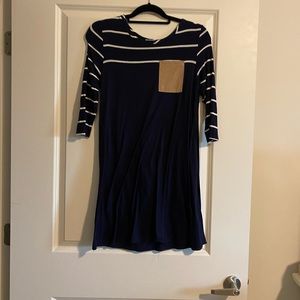 Charming Charlie navy blue and white striped dress with tan pocket